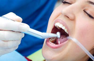 Satisfied patient's smile after service at Smile Dental Care